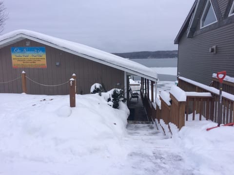 Entry way. Deck with a direct view of the lake out front.