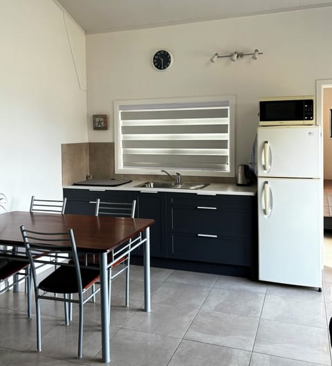 Kitchenette with basic pantry items and many utensils for cooking and BBQs