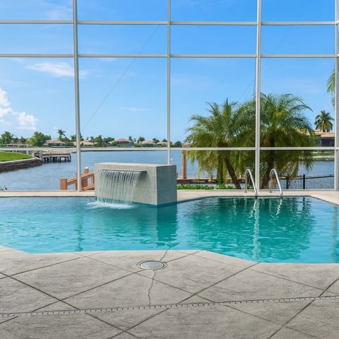 Heated pool with wide canal views