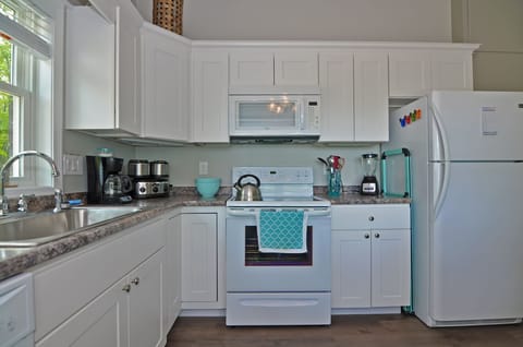 Fully stocked kitchen, we provide most products. Corner store min. away