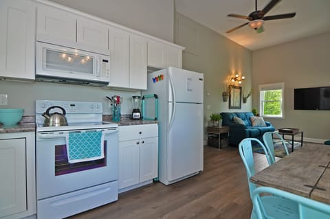 Fold open table seats 4, ice maker in frig.  