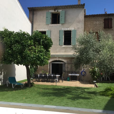 The back of the house from beyond the pool