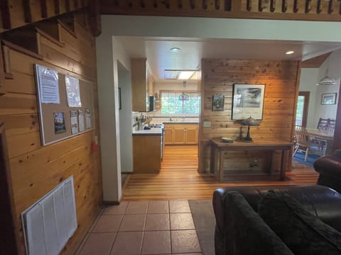 View of kitchen and living room upon entering the cabin