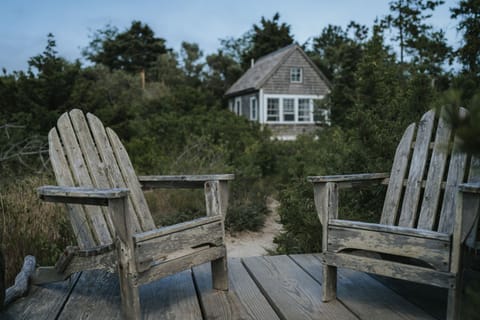 The Shack and its dune chairs overlooking the bay