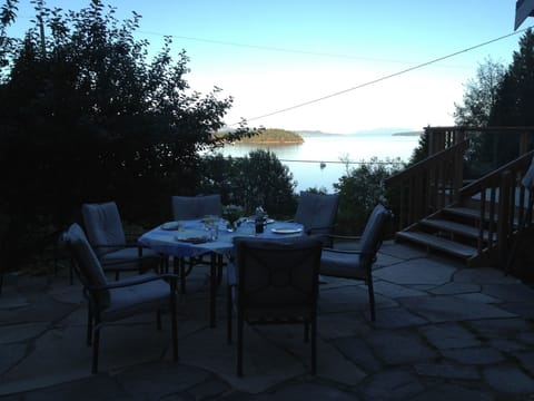 Dinner on the stone patio as the sun sets.