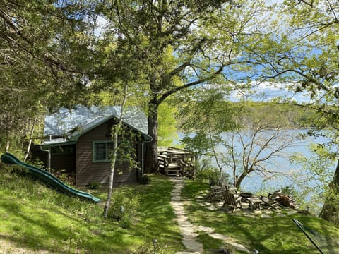 Copake Lakehouse (lakefront). 3 bedrooms, sleeps 8. 14 ft slide, firepit, + more
