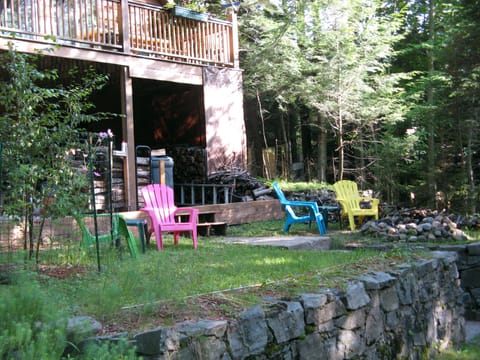Fire pit with Adirondack chairs