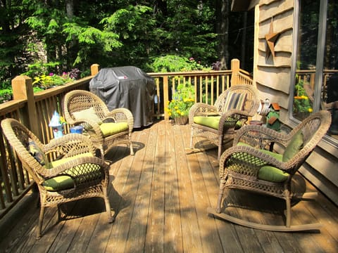 Other side of deck with gas grill