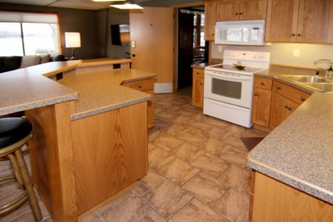 Open south side kitchen with dishwasher, micro and oven.