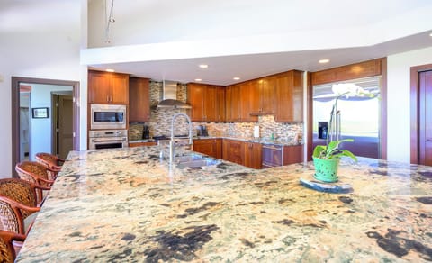 There is plenty of seating at the bar counter to converse with the chef