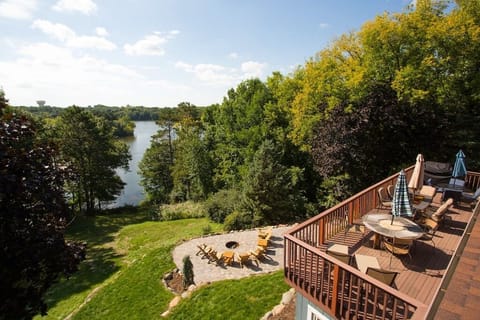 Perched high above Lake Schmidt, this home offers sweeping lake views from the spacious deck and the immaculate fire-pit patio.