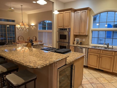 Kitchen has subzero wine storage, double ovens, gas cooking,2 dishwasher drawers