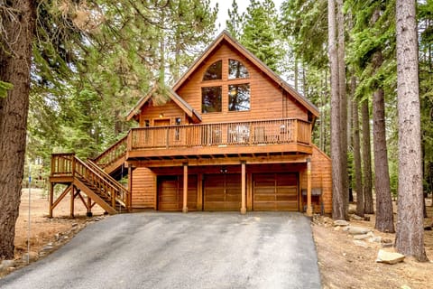 Cabin nestles on over a half acre of pristine pines full of squirrels and deer
