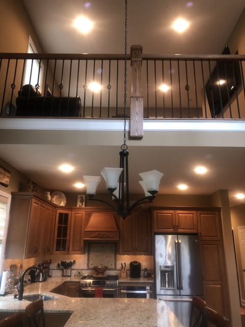 Looking Up at Loft from Main Living / Dining Area.