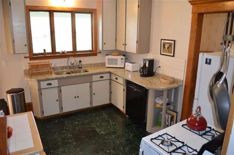 Kitchen with new granite counter, new dishwasher.  Fridge, stove, fully equiped.