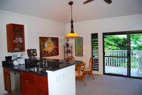 18 feet of vaulted ceiling with Island breezes off the water view Lanai.

 