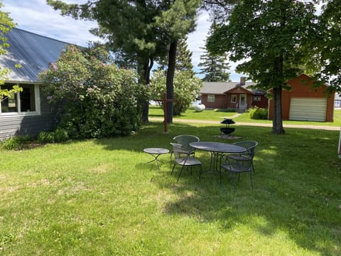 Backyard with Fire pit and Peek a boo bay view.