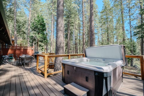 Gather with family and friends on the expansive deck, where you can grill dinner, soak in the hot tub, or enjoy meals at the outdoor table surrounded by fresh mountain air.