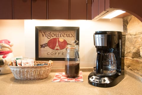 Coffee and a small variety of hot chocolate and tea are provided for guests