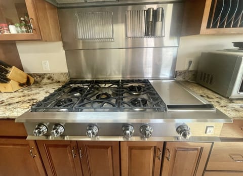 Top the line Hestan 48”  cooktop with griddle . 