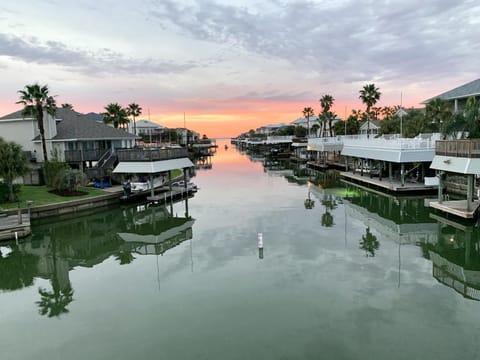 Beautiful sunset views looking down the canal into the Galveston Bay!