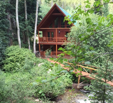 Back side of cabin faces river