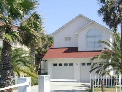 Front of house with 2 car garage. 