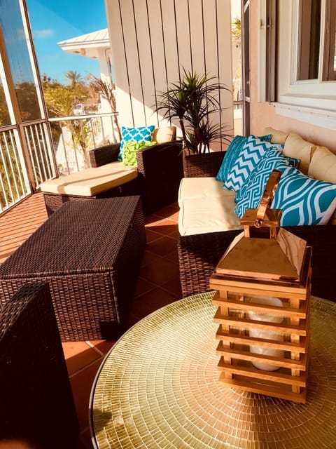 Upper covered patio with new outside sitting area