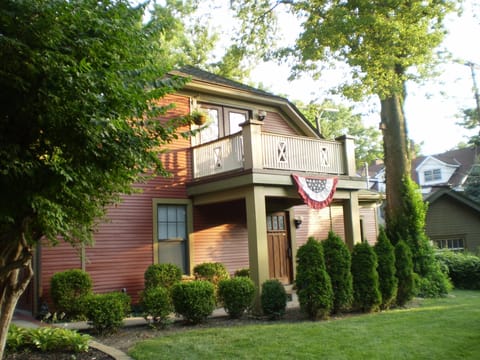 Entrance to Carriage House, showing balcony