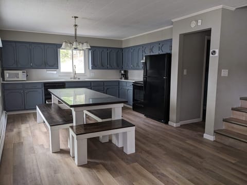 Amazing farmhouse table seating 8+.