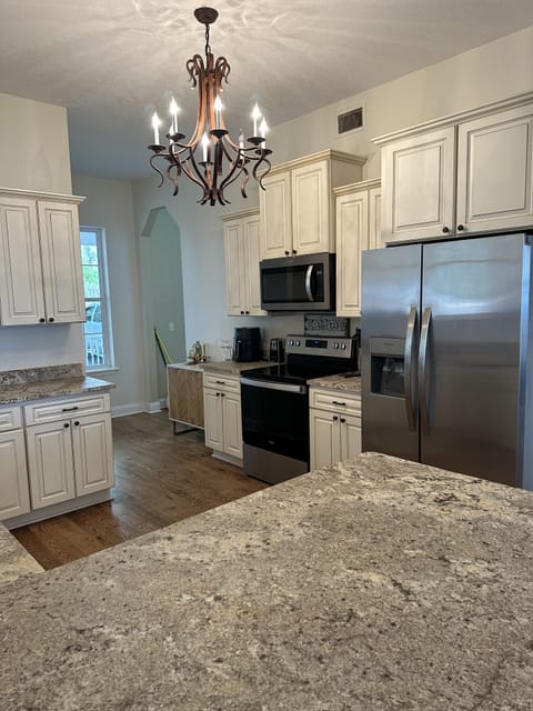 Granite countertops, stainless steel appliances
