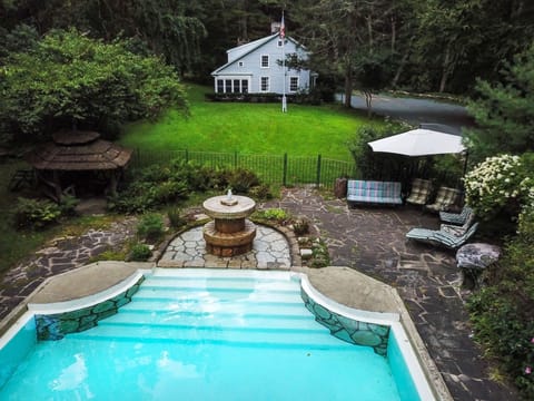 The property is named after the blue springs that fill the white pool and creek.