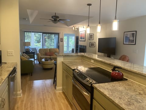 View from laundry room through kitchen to the living room