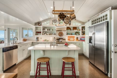 One of two dining room kitchen entryways. Island has a high-quality water filter