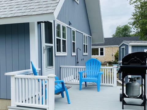 Deck, grill, shower, shed with toys, games, chairs, full yard, picnic table