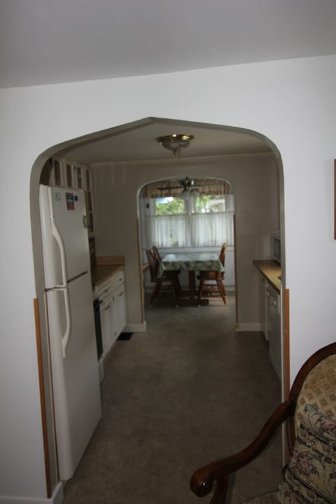 View from Living Area through Kitchen to Dining Table.  