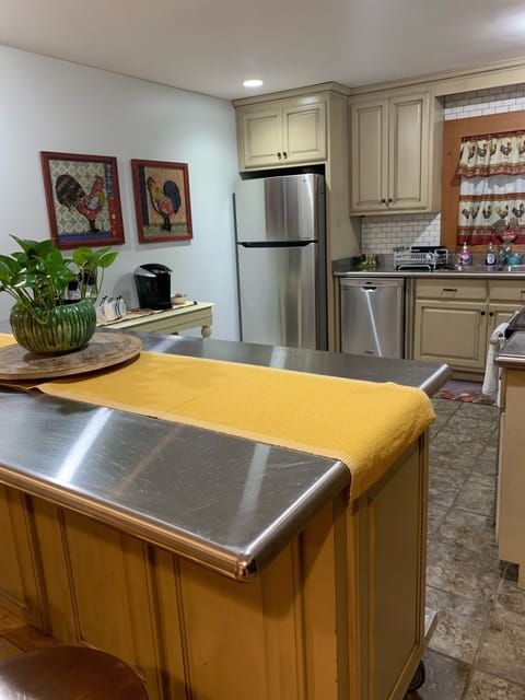 Kitchen island/counter seats 4. Perfect for brunch.
