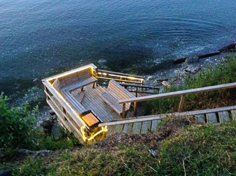 Stairs to beach with LED lighting; crab cooking & cleaning station at landing.