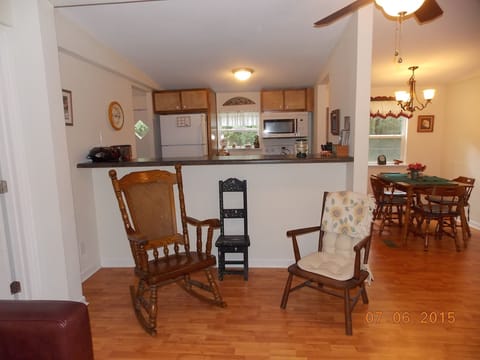Bar between kitchen and living room for setting up food.
