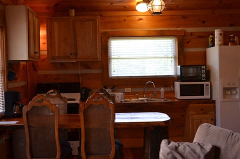 Kitchen area with full Ref., Electric Stove, Service for 4