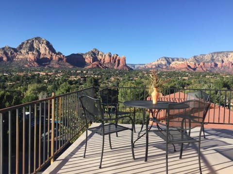 View from the balcony.
Outdoor space surrounded by red rocks.