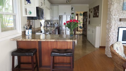 Kitchen and small eating area.