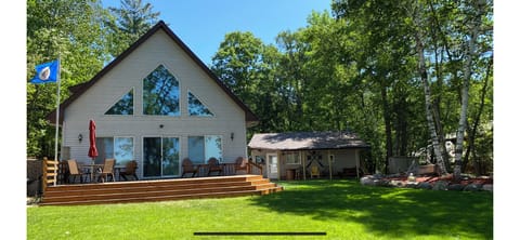 Main Cabin with new large lake-side deck and the Guest cabin just feet away.