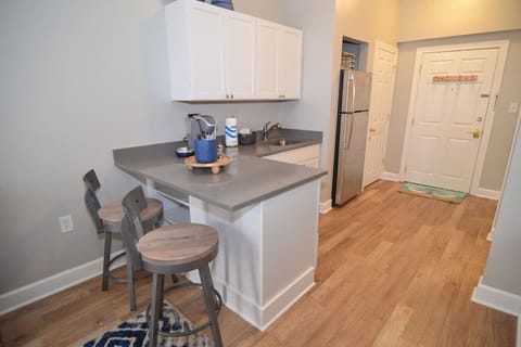 Fully equipped kitchenette features dining space for two