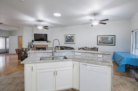 Large modern Chef's Kitchen with center island in open concept Great Room design