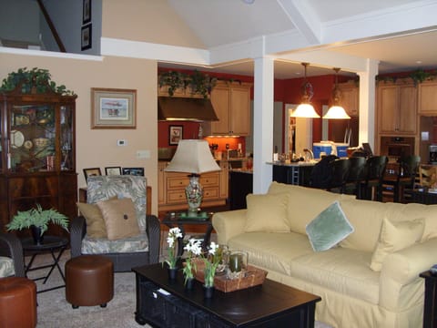 Open concept eat in kitchen w/KitchenAid Stainless professional appliances.