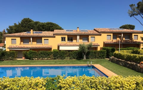 Front with terrace and pool