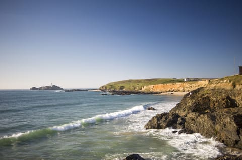 Godrevy Lighthouse and Godrevy point, just a short walk from Gwithian Holidays.