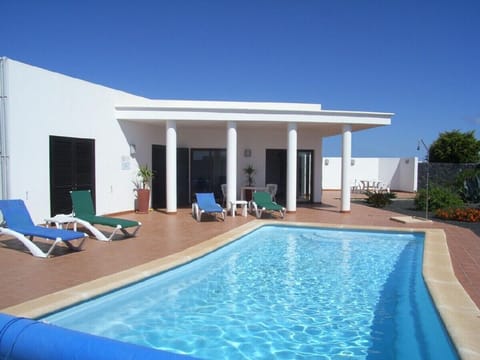 Villa Alicia's inviting heated pool - only a step away !