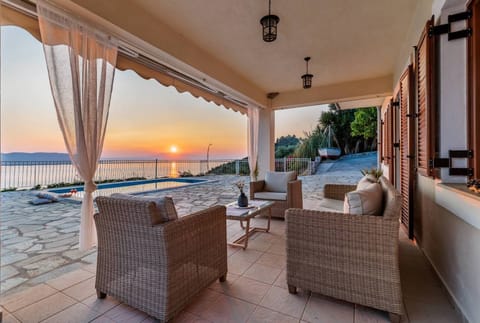 gaze the sunset hues and views of Skiathos island